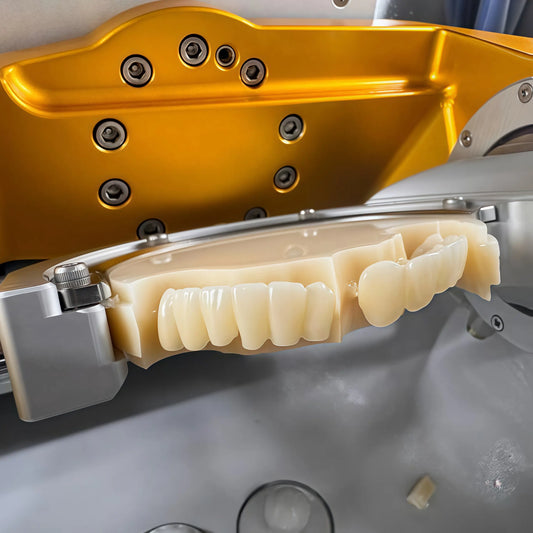 Precision-milled monolayer PMMA disc for aesthetic dental applications