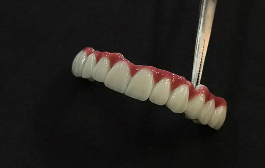 Different types of zirconia discs for dental restorations showing various translucency levels and applications