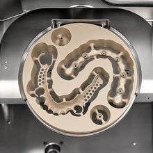 Pink PEEK disc during CAD CAM milling process for dental laboratory applications