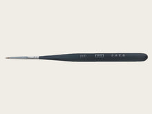 dental-technician-using-porcelain-brush-pen-for-crown-finishing