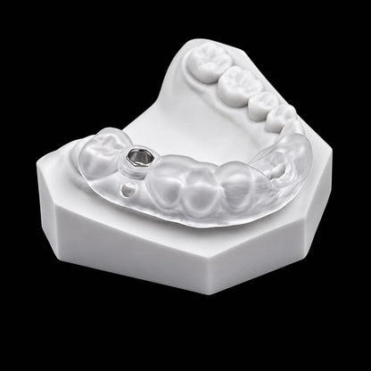 Transparent dental surgical guide made from Clear PMMA on a dental model