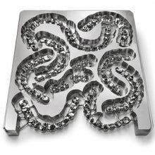 Milled Grade 5 titanium alloy 140 x 150mm blank with dental framework restorations
