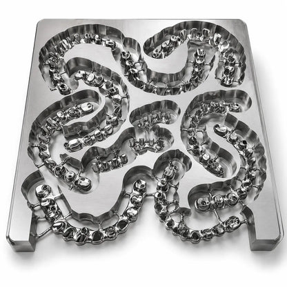 Milled Grade 5 titanium alloy 140 x 150mm blank with dental framework restorations