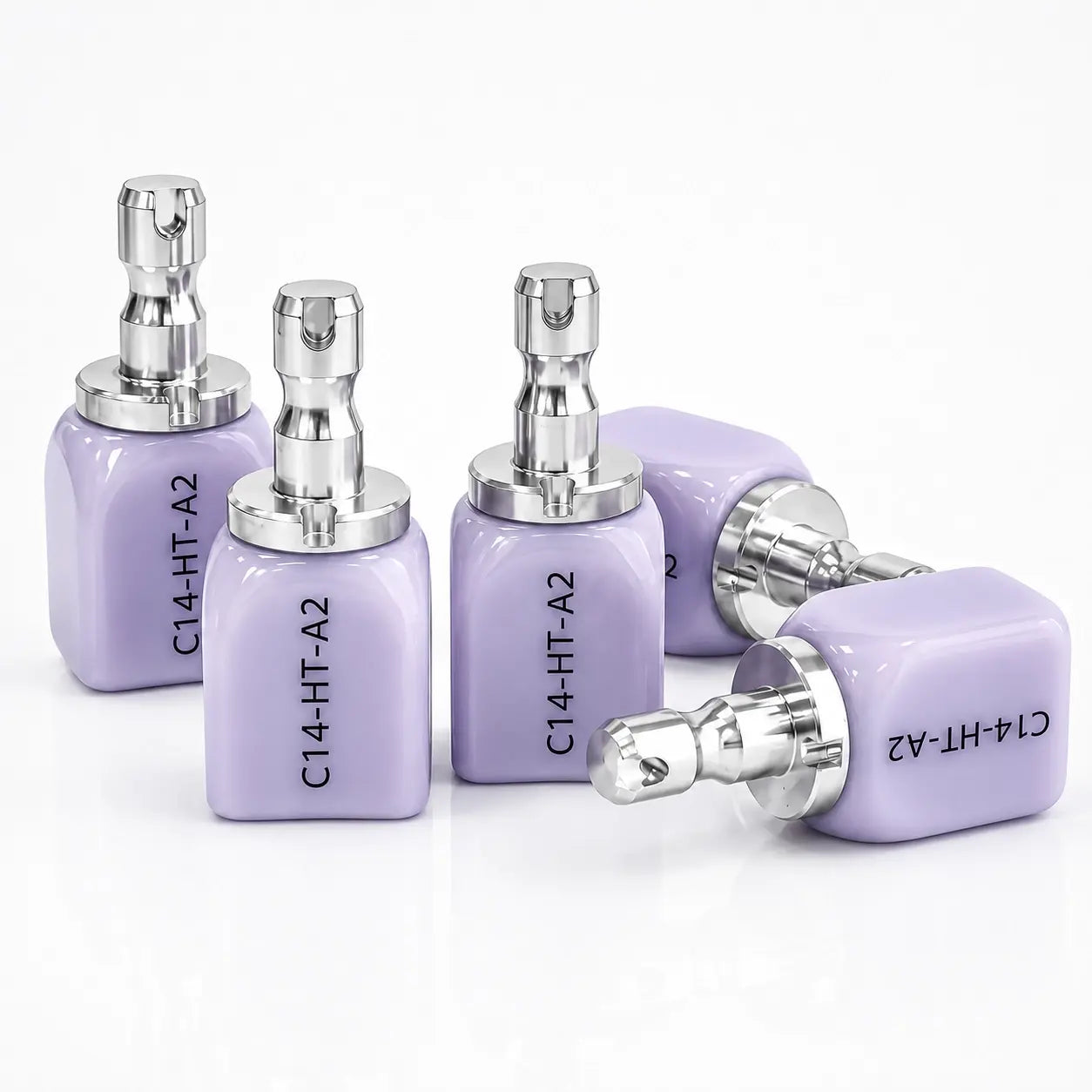 Five Lithium Disilicate CAD/CAM Blocks in A2 shade with metal holders displayed on a white background