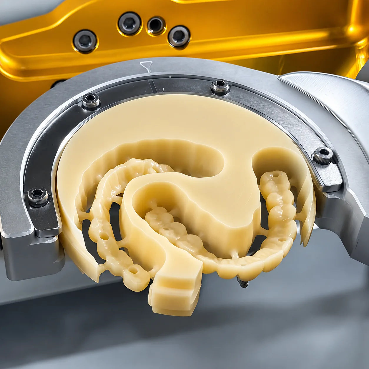 Monolayer PMMA disc being milled for temporary crowns and bridges