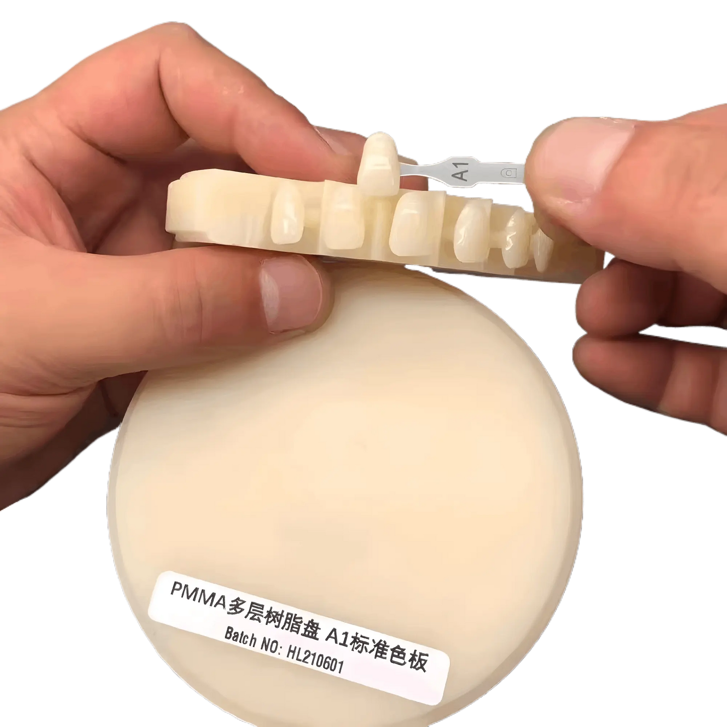 Multi-layered PMMA block for lifelike color transitions in dental prosthetics