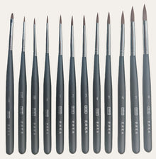 Close-up view of precision dental ceramic glaze brush pen for porcelain crown and veneer applications