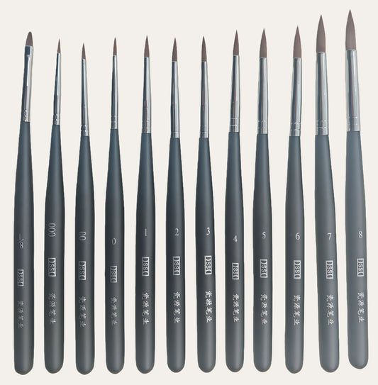 Close-up view of precision dental ceramic glaze brush pen for porcelain crown and veneer applications